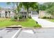 Street view of a charming two-story home with a two-car garage, a front yard, and a concrete driveway at 2759 Beddington Way, Suwanee, GA 30024