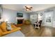 Inviting living room featuring a fireplace, comfortable seating, and plenty of natural light at 2759 Beddington Way, Suwanee, GA 30024