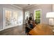 Comfortable office space with hardwood floors, ample natural light, and french doors at 2759 Beddington Way, Suwanee, GA 30024