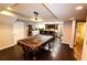 Finished basement with pool table, bar area, and access to other rooms at 308 Forkwood Trl, Woodstock, GA 30189