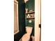 Dark turquoise half bath with pedestal sink and toilet at 308 Forkwood Trl, Woodstock, GA 30189