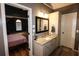Bedroom view features a granite countertop vanity and ensuite bathroom at 308 Forkwood Trl, Woodstock, GA 30189