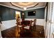 Dining room with hardwood floors, wainscoting, and a chandelier at 308 Forkwood Trl, Woodstock, GA 30189