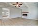 Bright living room with coffered ceilings and a modern fireplace at 327 Tulip Dr, Covington, GA 30016