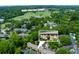 Aerial view of apartment complex near Bobby Jones Golf Course, surrounded by lush greenery and trees at 100 Biscayne Nw Dr # D7, Atlanta, GA 30309