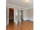 Spacious bedroom with hardwood floors, featuring multiple closets and bright natural light at 100 Biscayne Nw Dr # D7, Atlanta, GA 30309