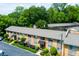 Apartment building exterior with manicured landscaping and stone accents, offering a welcoming curb appeal at 100 Biscayne Nw Dr # D7, Atlanta, GA 30309