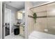 Bathroom with a marble countertop and tub at 1127 Riverbend Club Se Dr, Atlanta, GA 30339