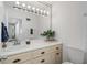 Well-lit bathroom featuring a white countertop and vanity with decor at 1127 Riverbend Club Se Dr, Atlanta, GA 30339