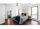 Bright bedroom with hardwood floors, neutral paint, and large windows offering great views at 1127 Riverbend Club Se Dr, Atlanta, GA 30339