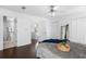 Bright bedroom with hardwood floors and access to the bathroom at 1127 Riverbend Club Se Dr, Atlanta, GA 30339