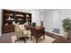 Office featuring a large wooden desk and a bookshelf at 1127 Riverbend Club Se Dr, Atlanta, GA 30339