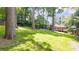 A serene backyard features lush greenery, offering a tranquil escape and opportunities for outdoor activities at 2044 Wilandrew Dr, Decatur, GA 30033
