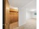 Partially finished basement with closet and adjacent unfinished space at 2044 Wilandrew Dr, Decatur, GA 30033