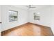 Bright bedroom with hardwood floors and two windows overlooking the backyard at 2044 Wilandrew Dr, Decatur, GA 30033