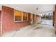 View of the house and attached carport with brick column and exterior walls at 2044 Wilandrew Dr, Decatur, GA 30033