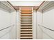 Bright closet is equipped with rods and shelving for maximum storage at 2044 Wilandrew Dr, Decatur, GA 30033