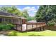 A well-maintained deck offers a serene spot for outdoor lounging and entertainment in a private backyard setting at 2044 Wilandrew Dr, Decatur, GA 30033