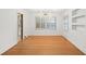Bright living area features hardwood floors, built-in cabinets, and ample natural light at 2044 Wilandrew Dr, Decatur, GA 30033