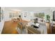 Bright living room showcasing a dining area, sofa and modern chandelier at 2044 Wilandrew Dr, Decatur, GA 30033