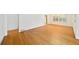 Open-concept living space featuring hardwood floors and neutral decor at 2044 Wilandrew Dr, Decatur, GA 30033