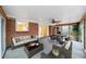Bright sun room featuring a seating area and a poker table with large windows at 2044 Wilandrew Dr, Decatur, GA 30033