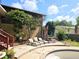 Backyard features a patio and swimming pool at 1244 Hickory Wood Ne Dr, Woodstock, GA 30188