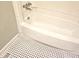 Bathtub and tiled floor at 1244 Hickory Wood Ne Dr, Woodstock, GA 30188