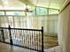 View of upper level sun room area featuring large windows and lots of natural light at 1244 Hickory Wood Ne Dr, Woodstock, GA 30188