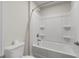 Clean bathroom features a bright white shower-tub with a curved shower rod at 15 Parkside Vw, Cartersville, GA 30121