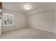 Bedroom with neutral carpet, one window and a single light at 15 Parkside Vw, Cartersville, GA 30121
