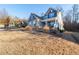 Front exterior view of home with manicured lawn and inviting covered front porch at 15 Parkside Vw, Cartersville, GA 30121
