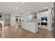 Bright kitchen boasts an island, stainless steel appliances, and modern finishes for a luxurious cooking experience at 15 Parkside Vw, Cartersville, GA 30121