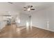Open-concept living space features hardwood floors, leading to the kitchen and staircase at 15 Parkside Vw, Cartersville, GA 30121
