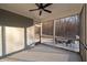 Comfortable screened porch with ceiling fan and great outdoor view, providing space for relaxation at 15 Parkside Vw, Cartersville, GA 30121