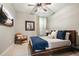 Serene bedroom featuring a rustic bed and a cozy atmosphere at 1598 Aldworth Se Pl, Marietta, GA 30067