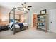 Cozy bedroom with a four-poster bed and view to ensuite bathroom at 1598 Aldworth Se Pl, Marietta, GA 30067