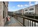 Inviting outdoor deck with seating area, offering a relaxing space with views of the community at 1598 Aldworth Se Pl, Marietta, GA 30067