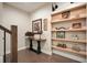 Elegant entryway with a console table, decorative shelving, and stylish lighting at 1598 Aldworth Se Pl, Marietta, GA 30067