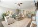 Spacious living room with a large rug, comfortable seating, and open floor plan at 1598 Aldworth Se Pl, Marietta, GA 30067