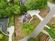 An aerial perspective showcases a well-kept home with an extended driveway and mature trees at 1770 Laurel Creek Dr, Lawrenceville, GA 30043