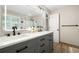 Elegant bathroom with double vanity, backlit mirror, and modern fixtures, offering a spa-like experience at 1770 Laurel Creek Dr, Lawrenceville, GA 30043