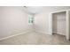 Cozy bedroom with neutral carpet, a window for natural light, and a closet for ample storage space at 1770 Laurel Creek Dr, Lawrenceville, GA 30043