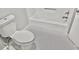 Nicely remodeled bathroom, with new black and white floor, new toilet, and bathtub at 3045 Revere Cir, Snellville, GA 30039