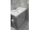 This bathroom features a gray vanity with a white sink and a silver faucet at 335 Chase Woods Cir, Jonesboro, GA 30236