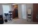 This bedroom has a desk, closet, and bathroom just off the main area at 335 Chase Woods Cir, Jonesboro, GA 30236