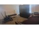 Inviting living room with comfortable seating, neutral carpet, and a large television at 335 Chase Woods Cir, Jonesboro, GA 30236