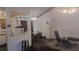 Bright living area showcasing view into kitchen and cozy seating at 335 Chase Woods Cir, Jonesboro, GA 30236