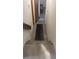 Carpeted stairway leading upstairs with neutral walls and wooden trim at 335 Chase Woods Cir, Jonesboro, GA 30236
