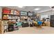 Spacious basement with ample storage shelving stacked high with bins and boxes at 11440 Azalea Trl, Hampton, GA 30228